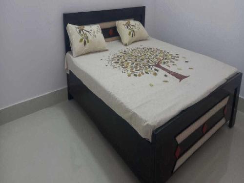 Кровать или кровати в номере OYO Hotel Rohit Sagar