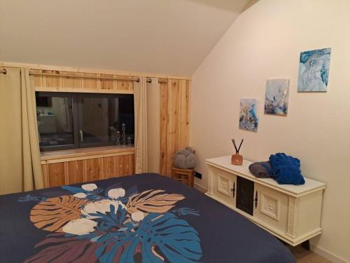 Un ou plusieurs lits dans un hébergement de l'établissement 2 bedrooms house with sauna terrace and wifi at Gembloux