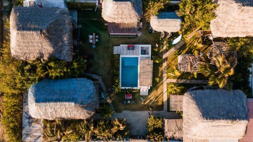 an overhead view of roofs of houses with a pool at Kite Eco House Salinas del rey in Salina de Rey