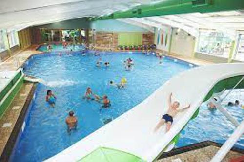 a group of people in a swimming pool at Premium location - Sleeps 6 - Caravan on The Lakes in Mablethorpe