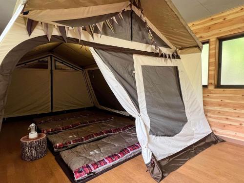 a bedroom with a tent in a cabin at Nagatoro Camp Village - Vacation STAY 06871v in Minano
