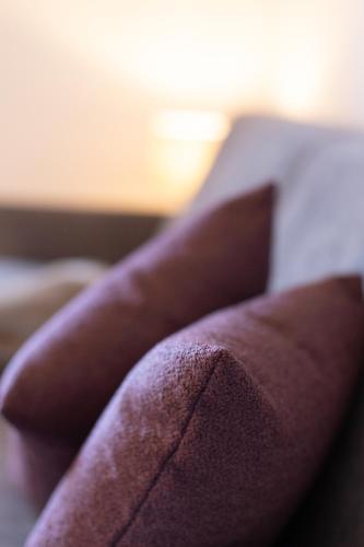 a close up of a persons arm on a couch at Residence Walchhof in Schenna