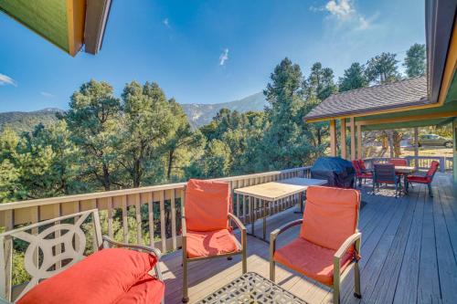 a deck with chairs and a table and a table at Pine Mountain Club Home with Beautiful View! in Frazier Park