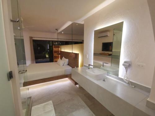 Salle de bains dans l'établissement Kuun Taak Tulum