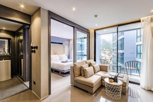 Ένα ή περισσότερα κρεβάτια σε δωμάτιο στο Citygate Condo Kamala Phuket