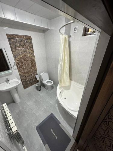 Ένα μπάνιο στο EVERLAND Guest House