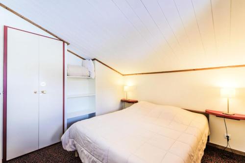 Ένα ή περισσότερα κρεβάτια σε δωμάτιο στο Résidence Le Mont Soleil - maeva Home - Appartement 3 pièces 7 personnes Séle 17