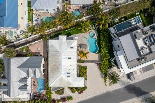 an overhead view of a house with a swimming pool at Approx 40 steps to beach entrance of Anna Maria beach in Anna Maria