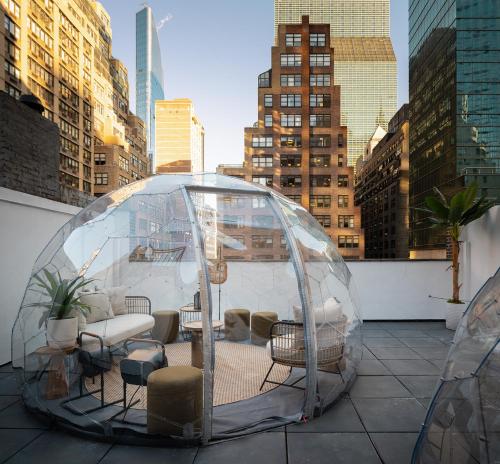a glass dome on top of a building at Little Charlie Hotel in New York