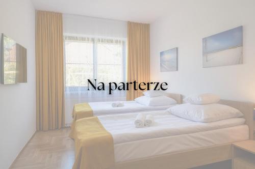 Postel nebo postele na pokoji v ubytování Willa Aga
