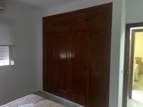 Katil atau katil-katil dalam bilik di Chalet el castillo