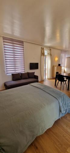 Ένα ή περισσότερα κρεβάτια σε δωμάτιο στο Villa Rosaria