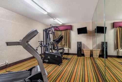 a hotel room with a gym with a treadmill at Quality Inn Marietta near Dobbins ARB in Marietta