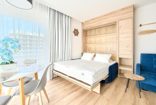 מיטה או מיטות בחדר ב-3L Apartments Kasprowicza 20C free POOL, Sauna and GYM