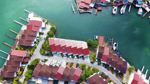 an aerial view of a group of houses next to the water at 232D South Finger in Jolly Harbour