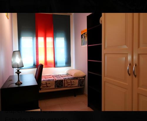 Кровать или кровати в номере Apartament Calella