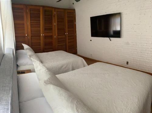 Кровать или кровати в номере Hotel Marina Puerto Dorado - Todo Incluido