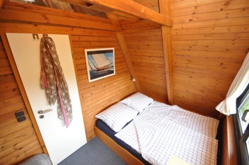 Postel nebo postele na pokoji v ubytování Ferienhaus Seestern