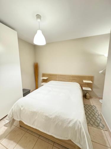 Postel nebo postele na pokoji v ubytování Beach Flat Albir,Esmeralda