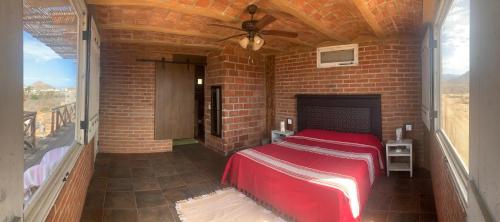 Una cama o camas en una habitación de Baja69 lodge