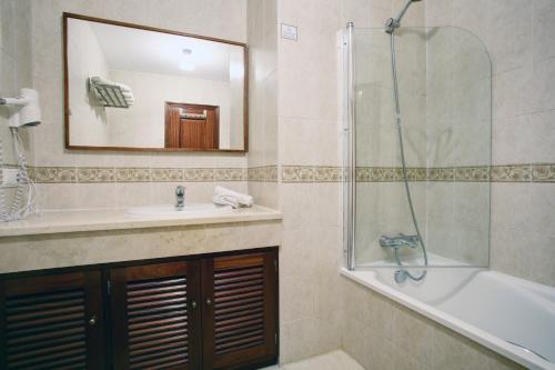 Ett badrum på Sanpedro Apartamentos Marbella