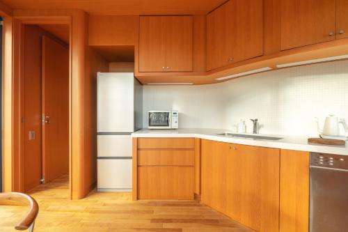 Fotografie z fotogalerie ubytování NASU PRIVATE FOREST: 広大な森の中のモダンハウス v destinaci Shiozawa