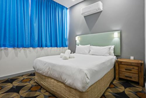 Una cama o camas en una habitación de The Gladstone