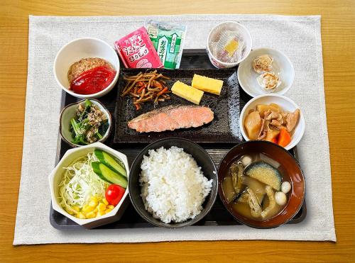 a tray of food with rice and different types of food at Hotel LC Gifu Hashima in Hashima