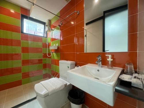 a bathroom with a sink and a toilet at @ style sukhumwit bangna3 in Bangna