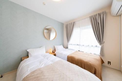 Katil atau katil-katil dalam bilik di House Hotel 強羅