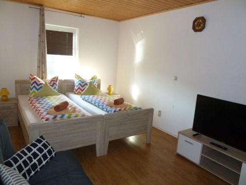 Katil atau katil-katil dalam bilik di Nice apartment in Himmelkron