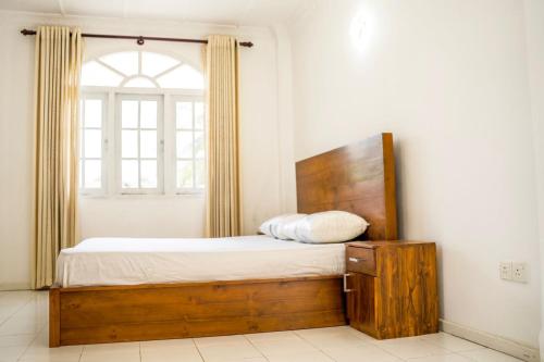Postel nebo postele na pokoji v ubytování Siam Rose Villa