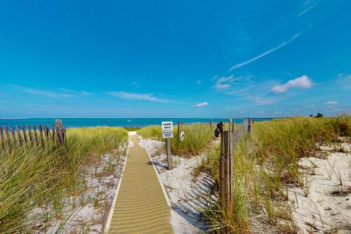 a path through the sand at the beach at Gramse Cape House in Barnstable