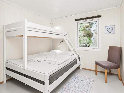 Ένα ή περισσότερα κρεβάτια σε δωμάτιο στο 10 person holiday home in Lindesnes-By Traum