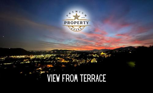 vista dalla cima di una città con vista dalla terrazza di Magic CHALET near COMO lake, private parking, total privacy I Villa dei Leoni a Morbio Inferiore