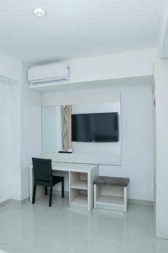 Μια τηλεόραση ή/και κέντρο ψυχαγωγίας στο Liberta Hotel Grand Sayang Makassar