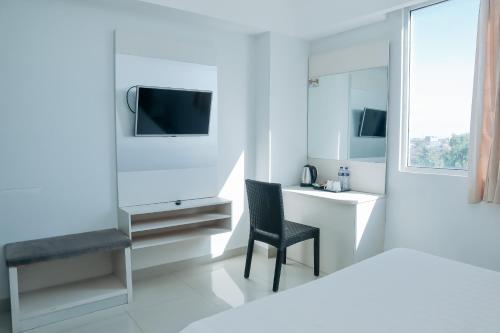 Μια τηλεόραση ή/και κέντρο ψυχαγωγίας στο Liberta Hotel Grand Sayang Makassar
