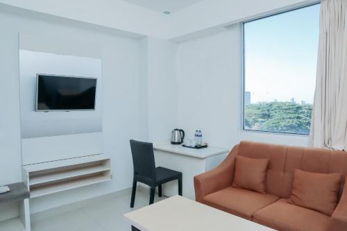 Χώρος καθιστικού στο Liberta Hotel Grand Sayang Makassar