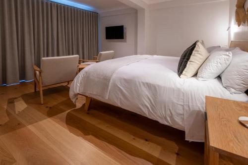 Кровать или кровати в номере Hide-Away Guest House