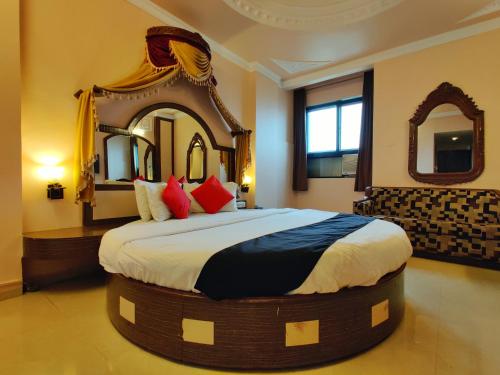 Postel nebo postele na pokoji v ubytování Hotel Pratap Heritage
