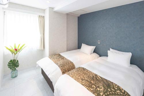 מיטה או מיטות בחדר ב-MARSOL C,S,Beach hotel - Vacation STAY 50047v