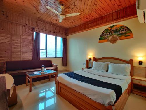 Postel nebo postele na pokoji v ubytování Hotel Pratap Heritage