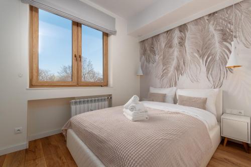 Katil atau katil-katil dalam bilik di Zdrowa Esthetic Apartment