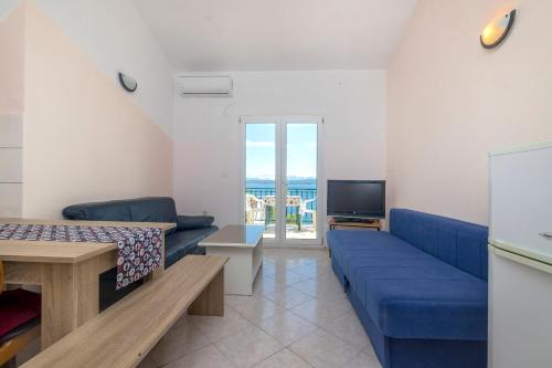 Ruang duduk di Apartments Oaza