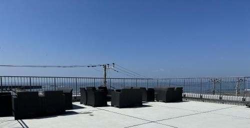 a group of chairs sitting on top of a roof at MARSOL C,S,Beach hotel - Vacation STAY 50798v in Chigasaki