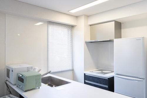 Η κουζίνα ή μικρή κουζίνα στο MARSOL C,S,Beach hotel - Vacation STAY 51604v