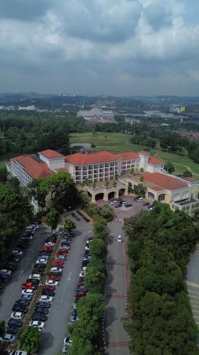 an aerial view of a parking lot in front of a building at Bangi Resort Hotel in Bangi