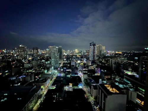 a view of a city at night at hotel in ermita manila birch tower in Manila