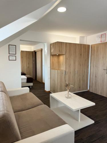 a living room with a couch and a table at Hiša Aleš in Kranj