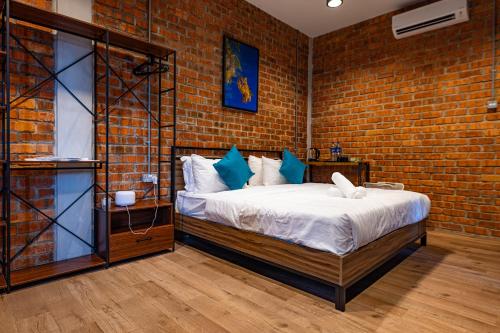 Postel nebo postele na pokoji v ubytování Sebayu Retreat Gopeng
